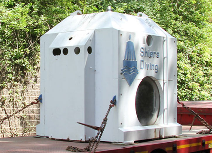 The Shiers Bell now stands proudly at the bottom of Stoney Cove as a testament to the epic work carried out by divers during construction of the Thames Barrier during the 1970s.